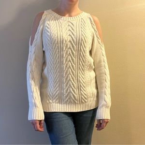 Cream white long sleeved sweater with shoulder cut outs